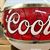Coors Globe Wall Mount Sconce  close-up of Coors logo unlit